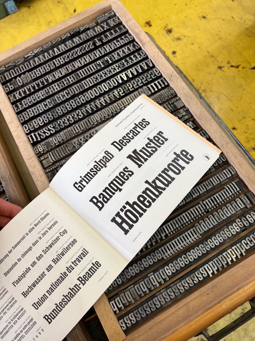 Superba condensed printed sample on physical metal type set in 36pt.